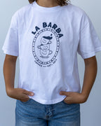 Person wearing a white t-shirt with 'La Barba Coffee' logo against a light gray background