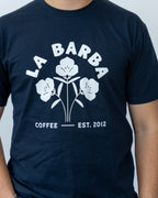 Navy blue t-shirt with 'La Barba Coffee' logo and text on a plain background