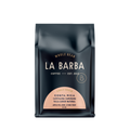 The image features a 12oz bag of La Barba Coffee, specifically their Costa Rica, Cafetalera Zamorana. The bag is designed with a dark background, prominently displaying the brand name "La Barba" in large, elegant letters. It highlights the coffee's origin, Costa Rica, along with a description of the flavor profile, including notes of apple pie, kiwi, and stone fruit. The design exudes a premium and modern feel with a minimalist, sophisticated look.