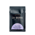 The image features a 12oz bag of La Barba Coffee, specifically their Ecuador Hacienda La Papaya, Typica Mejorado Anaerobic. The bag is designed with a dark background, prominently displaying the brand name "La Barba" in large, elegant letters. It highlights the coffee's origin, Ecuador, along with a description of the flavor profile, including notes of guava, white grape, and honey. The design exudes a premium and modern feel with a minimalist, sophisticated look.