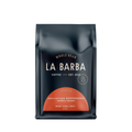The image features a 12oz bag of La Barba Coffee, specifically their Deviation Espresso. The bag is designed with a dark background, prominently displaying the brand name "La Barba" in large, elegant letters. It highlights the coffee's origin, Ethiopia, along with a description of the flavor profile, including notes of Bright, Floral ,and Fruity. The design exudes a premium and modern feel with a minimalist, sophisticated look.