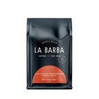 The image features a 12oz bag of La Barba Coffee, specifically their Deviation Espresso. The bag is designed with a dark background, prominently displaying the brand name "La Barba" in large, elegant letters. It highlights the coffee's origin, Ethiopia, along with a description of the flavor profile, including notes of Bright, Floral ,and Fruity. The design exudes a premium and modern feel with a minimalist, sophisticated look.