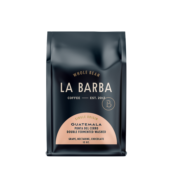 The image features a 12oz bag of La Barba Coffee, specifically their Guatemala Punta Del Cerro. The bag is designed with a dark background, prominently displaying the brand name 