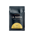 The image features a 12oz bag of La Barba Coffee, specifically their Kenya Kii. The bag is designed with a dark background, prominently displaying the brand name "La Barba" in large, elegant letters. It highlights the coffee's origin, Kenya, along with a description of the flavor profile, including notes of nectarine, white grape, and ice cream. The design exudes a premium and modern feel with a minimalist, sophisticated look.